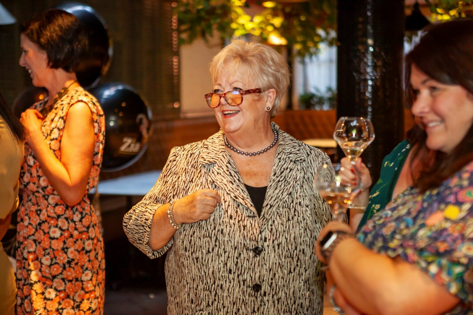 Vicki Williams wearing glasses and smiling