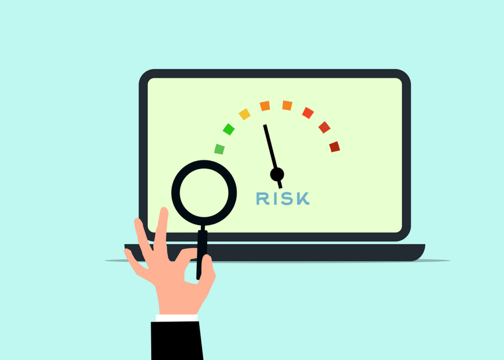 a scale measuring risk with an arrow pointing